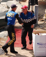 J. Michael Kelly, Mark Evans